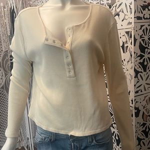 Cream colored thermal long sleeve top